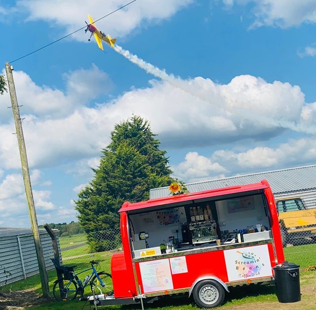 plane-flying-over-coffee-cart