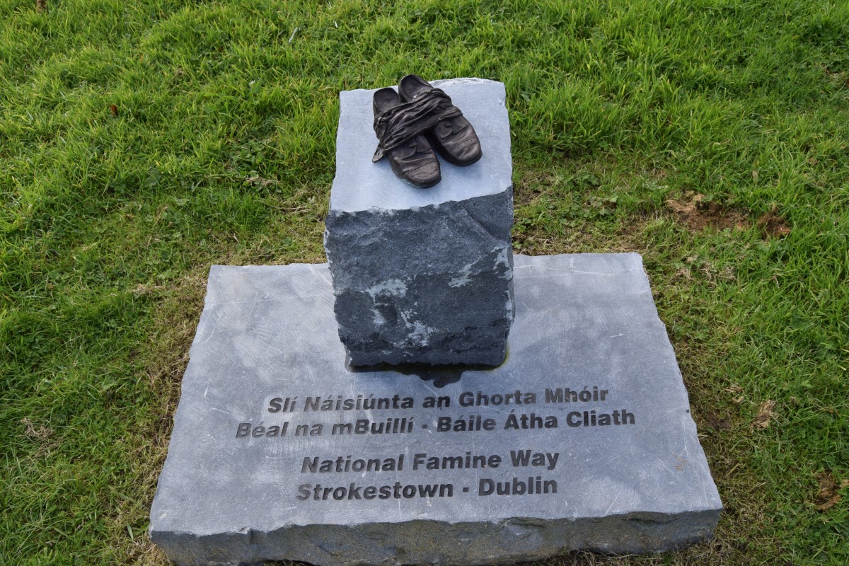 Bronze-Shoes-at-Mosstown-Harbour-representing-The-National-Famine-Way null